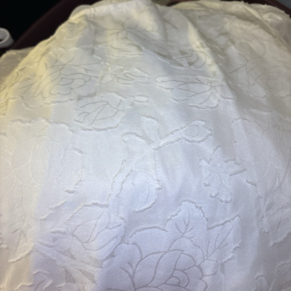 Zulily top in XXL has embossed flowers It’s  lining the sleeve are see-threw - Picture 12 of 15
